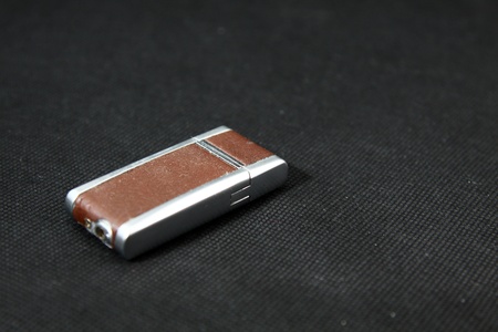 Fire lighter on black backgroundの写真素材