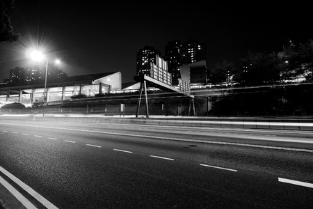 Traffic in modern city in black and white toneの写真素材