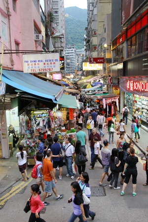 HONG KONG - OCT 9, An old street with many people walking to buy things in Wai Chai, Hong Kong on 9 October, 2010.のeditorial素材