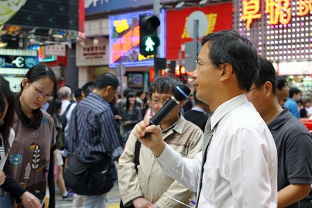 HONG KONG - NOV 20, LEUNG Ka Lau Member of Legislative Council (Medical) asks for donation in Hong Kong on 20 November, 2010.のeditorial素材