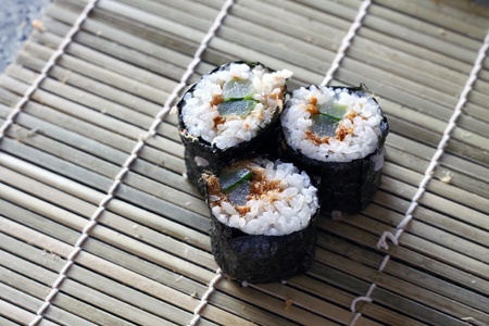 Home made sushi on bamboo plateの写真素材