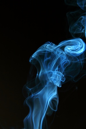 Abstract black smoke on black backgroundの写真素材