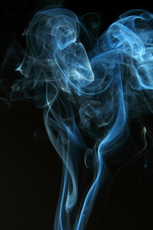 Abstract black smoke on black backgroundの写真素材