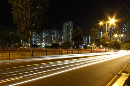 Traffic through downtown of Hong Kong at nightの写真素材