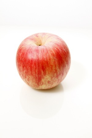 Red apple isolated on white backgroundの写真素材