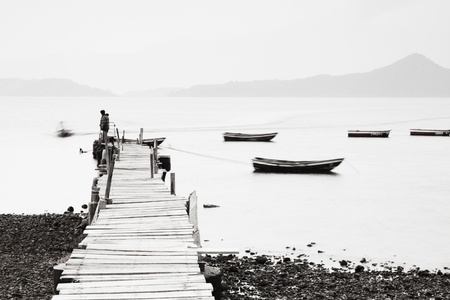 Lonely pier along the coast, low saturation image.の写真素材