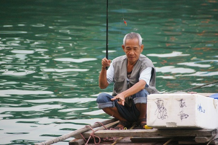 HONG KONG - NOV 29, An old fisherman in Hong Kong on 29 November, 2009. のeditorial素材