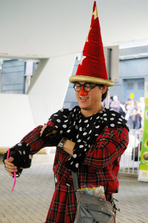 HONG KONG - JAN 16, Street performer playing magic in Hong Kong on 16 January, 2010.