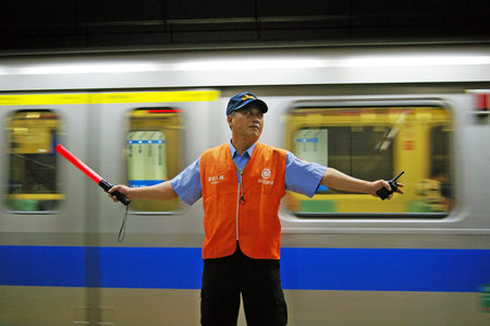 TAIWAN - MAY 21, A concentrated worked in train station of Taiwai in 21 May, 2009. 