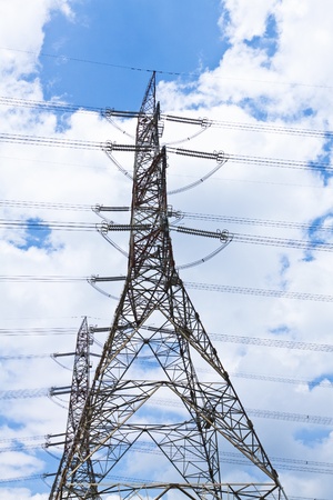 Transmission tower at blue skyの写真素材