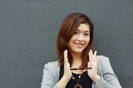 Asian woman with an ideaの写真素材