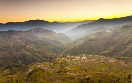 Yuanyang rice terraces sunset in Yunnan, China.の写真素材