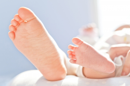 A close-up of baby feet の写真素材