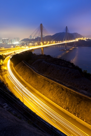 Highway and bridge at nightの写真素材