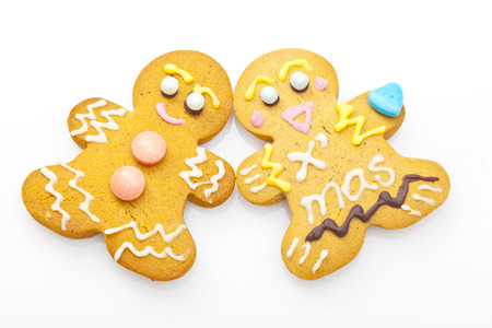 Ginger bread man cookies isolated on white backgroundの写真素材
