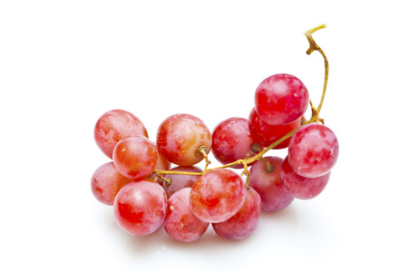 Red grapes isolated on whiteの写真素材