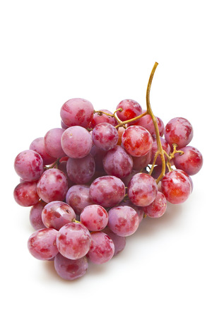 Red grapes isolated on whiteの写真素材