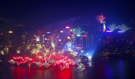 HONG KONG - 1 JANUARY: A splendid firework show and countdown celebration held in Hong Kong on 1 January, 2014. The show lasted for 8 minutes and lighted up the skies above the iconic Hong Kong skyscrapers. のeditorial素材