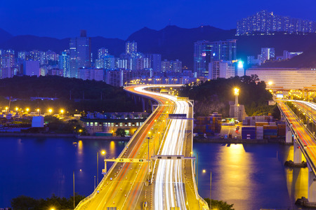 Modern highway in city at nightの写真素材