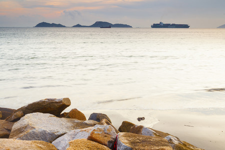 Sunset over the ocean with long exposureの写真素材