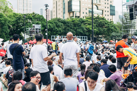HONG KONG - JULY 1: Hong Kong people seek greater democracy as frustration grows over the influence of Beijing on July 1, 2014 in Hong Kong. Organizers of protest claimed a turnout of 510,000 people.のeditorial素材