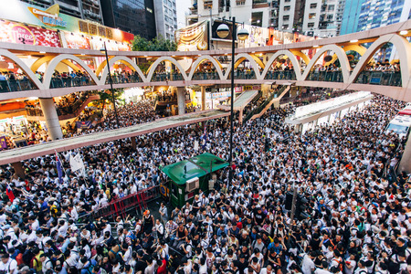 HONG KONG - JULY 1: Hong Kong people seek greater democracy as frustration grows over the influence of Beijing on July 1, 2014 in Hong Kong. Organizers of protest claimed a turnout of 510,000 people.のeditorial素材