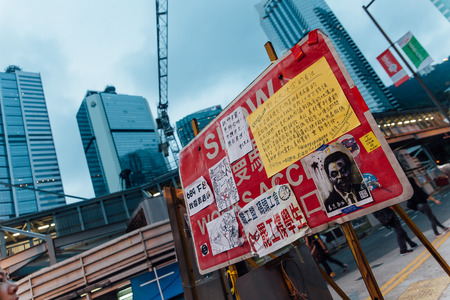 HONG KONG, OCT 2: Umbrella Revolution in Admiralty on 2 October 2014. There are many slogans and banners sticking along the road to deliver message to the public about this movement.のeditorial素材