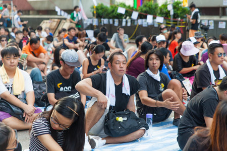 HONG KONG, OCT 1: Crowd of protesters occupy the road in Mongkok on 1 October 2014. Hong Kong people are fighting for a real universal suffrage for the next chief executive election.のeditorial素材