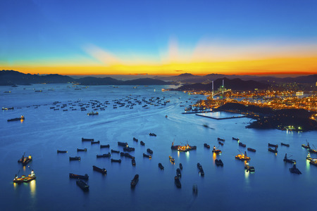 Sunset at container terminal in Hong Kongの写真素材
