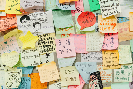 HONG KONG, OCT 24: Umbrella Revolution in Admiralty on 24 October 2014. There are many slogans created to express the movement to the public.のeditorial素材