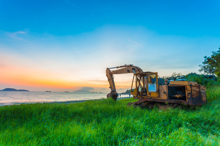 Dump truck at sunset along the beachの写真素材