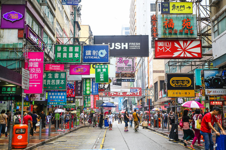 HONG KONG - May 24 : Crowds at Mongkok on May 24, 2015 in Hong Kong, China. Mongkok in Kowloon is one of the most Banner place in the world and is full of ads of different companies.のeditorial素材