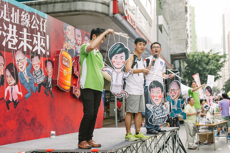 HONG KONG - JULY 1: Hong Kong people show their dissatisfaction to the Hong Kong government by march on July 1, 2015 in Hong Kong. Organizers of protest claimed a turnout of 48,000 people.のeditorial素材
