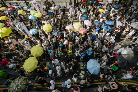 HONG KONG - JULY 1: Hong Kong people show their dissatisfaction to the Hong Kong government by march...
