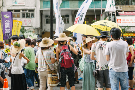 HONG KONG - JULY 1: Hong Kong people show their dissatisfaction to the Hong Kong government by march on July 1, 2015 in Hong Kong. Organizers of protest claimed a turnout of 48,000 people.のeditorial素材