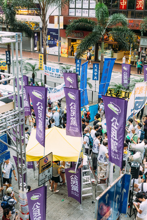 HONG KONG - JULY 1: Hong Kong people show their dissatisfaction to the Hong Kong government by march on July 1, 2015 in Hong Kong. Organizers of protest claimed a turnout of 48,000 people.のeditorial素材