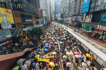 HONG KONG - JULY 1: Hong Kong people seek greater democracy as frustration grows over the influence of Beijing on July 1, 2015 in Hong Kong. Organizers of protest claimed a turnout of 48,000 people.のeditorial素材