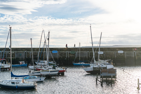 People walking along Harbour Front - Scarboroughのeditorial素材