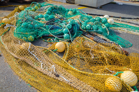 Fishing nets laid out on the floor at Saint Jean De Luz, Basque Country, France.の写真素材