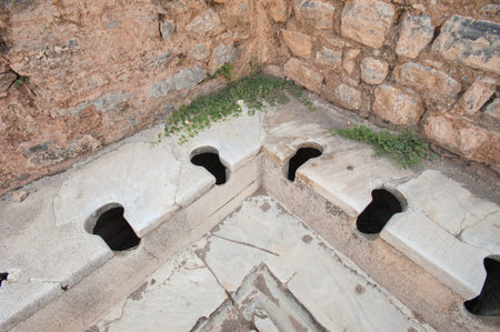 Old type toilets in the ancient city of Ephesus, Aydin, Turkey.の写真素材