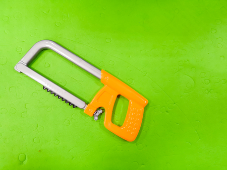 Children's bait, on a green background. Tool for the child, repairman detsky, development for children, preparing the child for adult lifeの写真素材