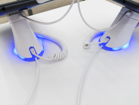 phone theft in the store, phones in the store, stand for the phone, theft on the stand, phones on the stand, charge for the phone.の写真素材