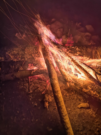 close the fire flame of marching fire, super slow motion of burning wood. Bright bonfire with beautiful sparks. Orange flameの写真素材