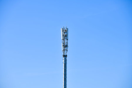 Digital telephone antenna. GSM tower on a blue background. 5g 4g.