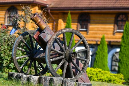 old iron gun. A cannon that shoots cores. Burning wick. Current model of an old artillery gun. naked gun, cannon on wheels, american civil war.の写真素材