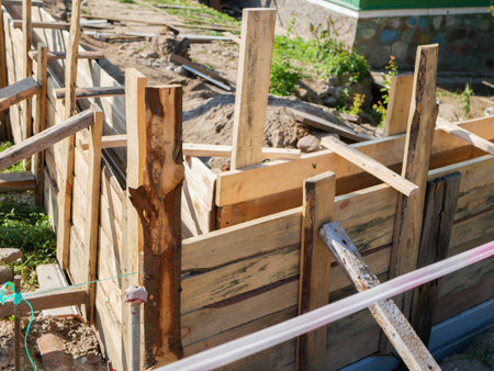supporting for the construction of a private fence. wood type. do it yourself repair. pouring...