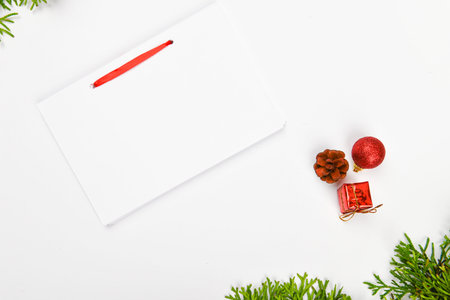 notebook with pen on christmas background. Empty white notebook and pen on white Christmas...