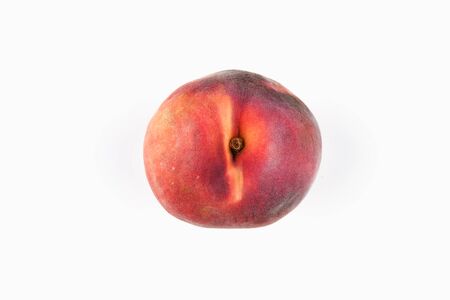 Peach on a white background. Fresh juicy peach on a white background. View from above. Place for writing. In isolation. Cut out the backgroundの写真素材