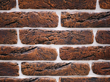 orange brick facade. Torn stone texture. Stone wall. abstract background.