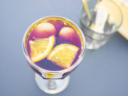 Mulled wine with lemon in a glass. A warming drink in the coldの写真素材